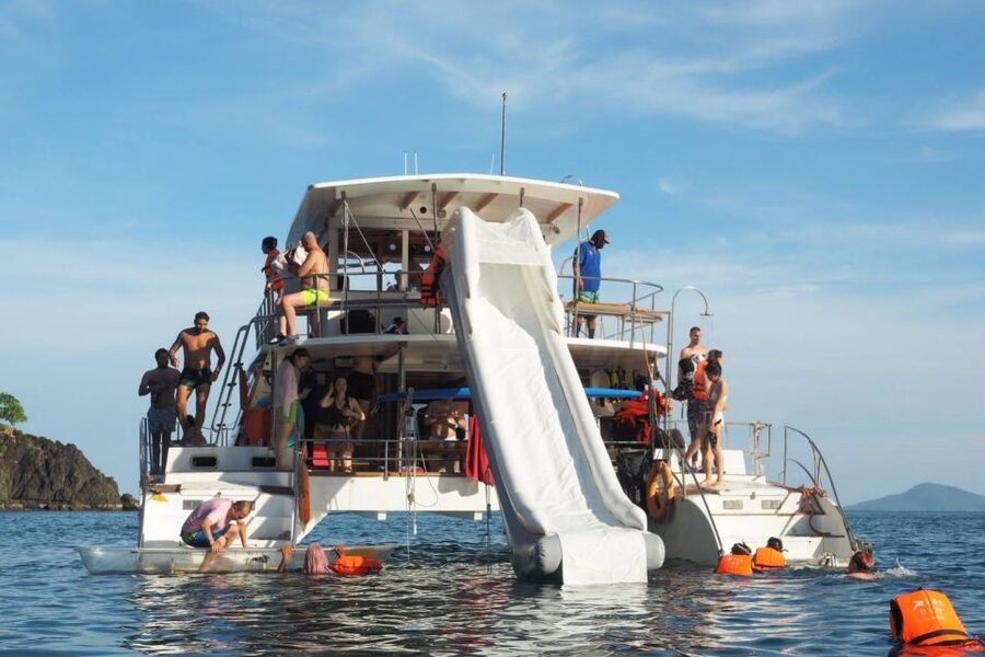 Amazing Coral Island & Sunset Dinner with Power Catamaran - Transfers, soft drinks, and included extras: real value math