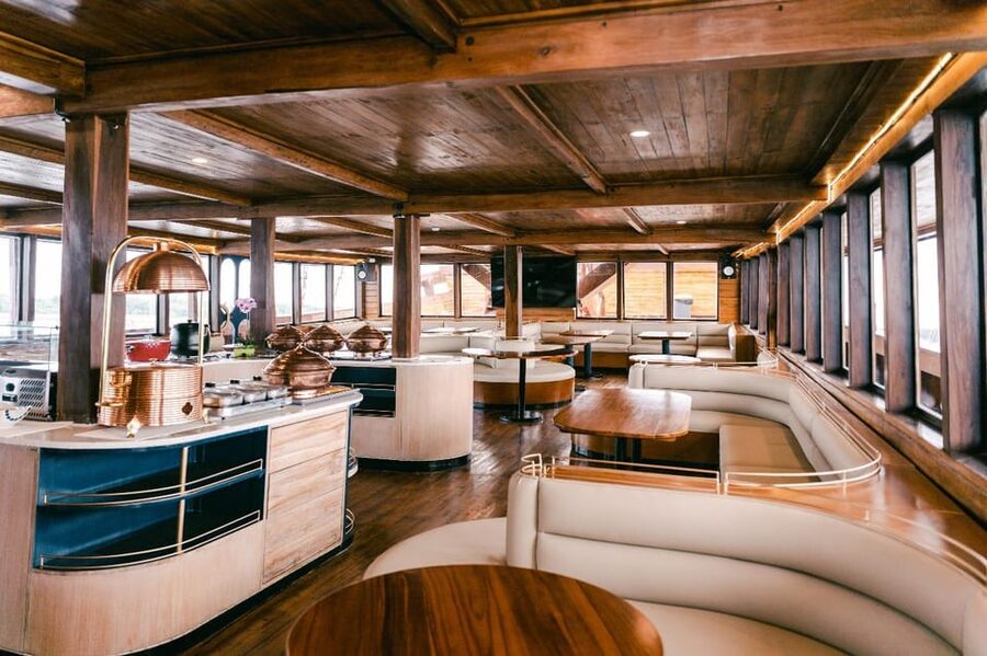 Bali Phinisi Cruise: Sunset Dinner with Live Music & Buffet - Nusa Dua Sunset and the Coastline Cruise Moment