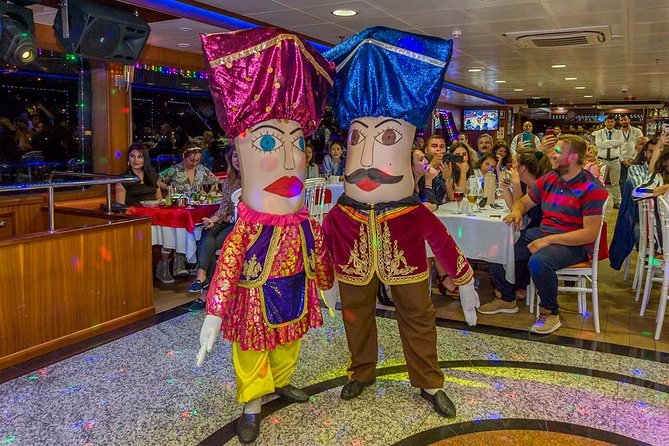 Bosphorus Dinner Cruise with Turkish Music and Live Performances - Dinner on Board: Meze, Your Choice of Main, and Baklava