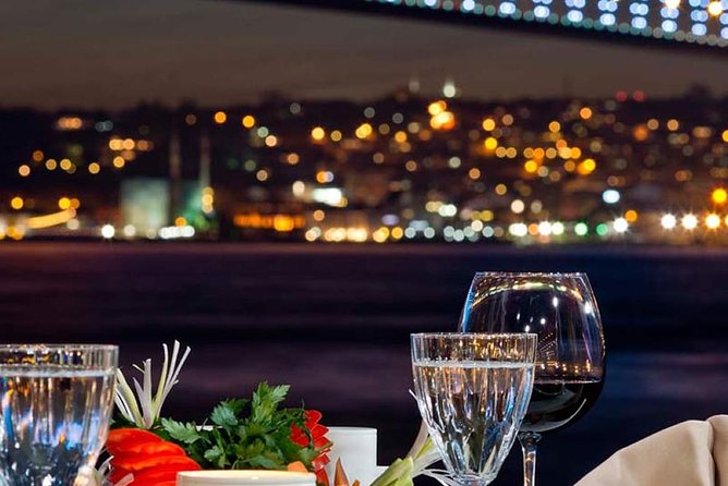 Bosphorus Night Cruise with Dinner, Show and Hotel Transfer - Nighttime Bosphorus views: palaces and the shoreline lights