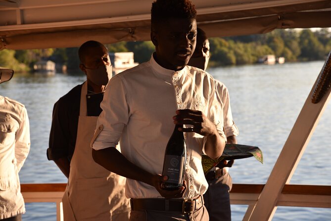 Dinner Cruise on the Zambezi River - Cruising the upper Zambezi: Victoria Falls mist as your opening act