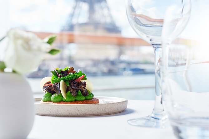 Early evening Dinner Cruise with drinks by Bateaux Parisiens - Mid-cruise landmarks: Notre-Dame area, Pont Neuf, and the National Assembly