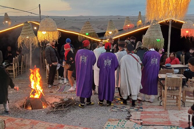 From Marrakech: Quad sunset dinner Experience & show - Camp welcome: Berber music, mint tea, and a bonfire
