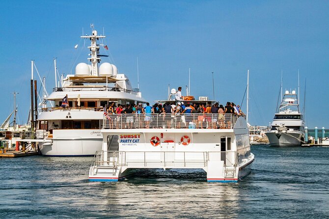 Key West Sunset Buffet Dinner Cruise with Open Bar and Live Music - Boarding the Catamaran: Deck Choices and Where You’ll Spend Your Time