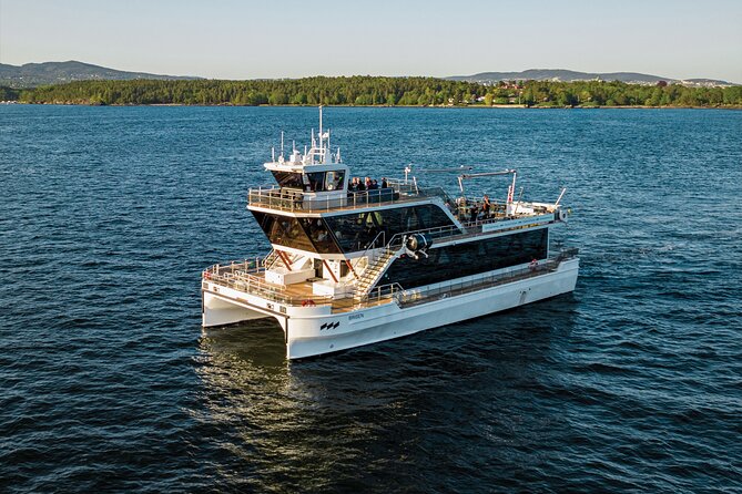 Oslo fjord 3-Course Dinner Cruise with Live Music - The Return to Oslo: Opera House, Aker Fortress, and Night Skyline Photos
