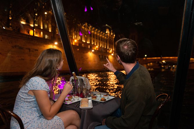 Paris Seine River Dinner Cruise with Champagne and Window Seating - Trocadéro, the Île de Cité, and Notre-Dame’s silhouette