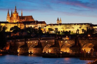 Prague Night Tour and River Vltava Dinner Cruise - The Coach Ride: Prague’s Illuminations From the Road