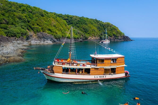 Scenic Promthep & Krating Cape Dining Experience Cruise - Crew and on-board vibe: friendly, music-led, and safety handled