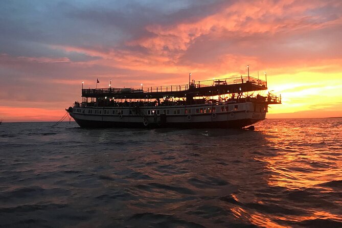 Sunset Dinner and drinks includes a Floating Village cruise tour. - Lotus farm stop on the way: quick photos plus lotus culture
