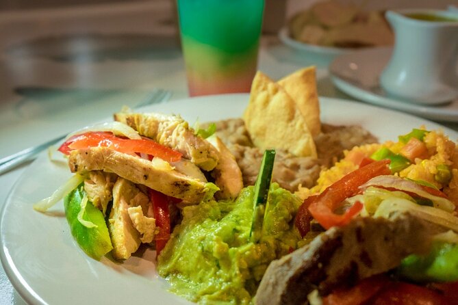 Sunset Dinner Show Cruise Tour in Cabo San Lucas - Check-in at the diner cruise and getting onto the boat