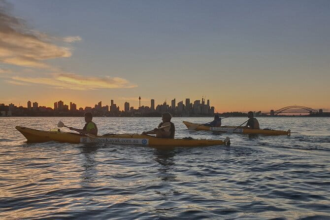 Sydney Harbour Sunset Dinner Paddle - Milk Beach breaks, swims, and the Strickland House option